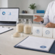 Earthworm peptide powder samples and quality documents during a B2B ingredient consultation in a clean lab office