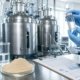AI-generated laboratory image showing lumbrokinase powder production, filtration equipment, sample vial, and quality-control records