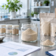 Earthworm protein powder sample with scale, sieve tray, supplier documents, sample pouches, and bulk cartons