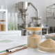 Earthworm protein powder manufacturing process with clean production equipment, sample jars, and quality documents