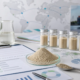 Earthworm peptide powder samples with global sourcing documents and B2B quality review charts