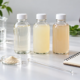 Conceptual beverage trial bench with unbranded prototype bottles, mixing beakers, generic powder sample vial, stirring rod, and blank notebook