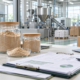 Earthworm protein powder samples, supplier documents, cartons, and a clean manufacturing office for direct sourcing review